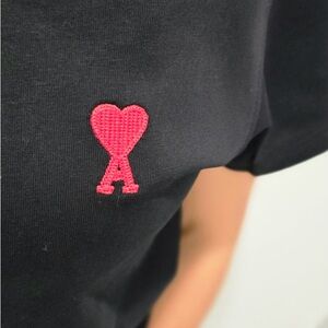 Ami tee available in pink, grey and black